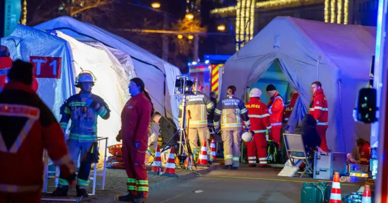 Car slams into crowd at Christmas market in Germany in suspected attack; at least 2 killed, dozens injured, officials say